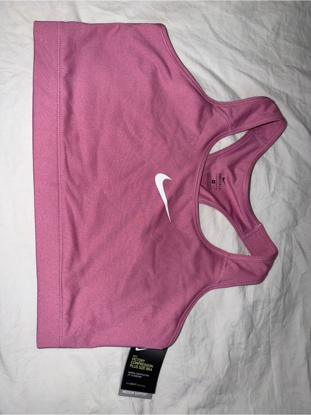 Nike Pink Compression Plus-Size Sports Bra with White Swoosh Tag